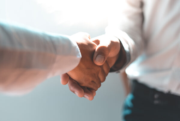 men and women negotiate to congratulate a successful business ,shaking hands concept.